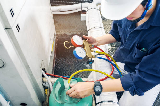 Technician is checking air conditioner